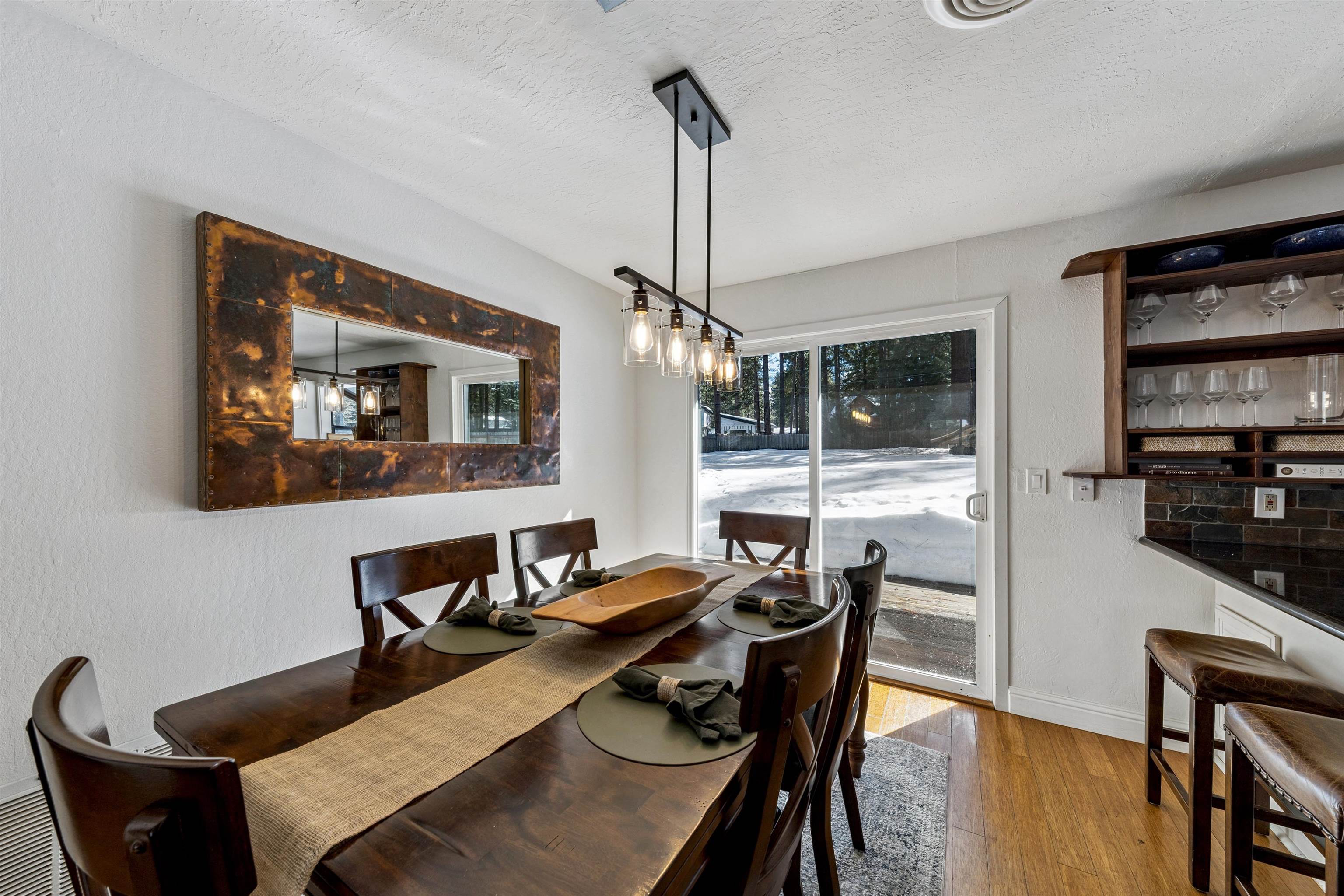 10895 Jeffery Pine Road Truckee, CA 96161 - Photo 13 of 25 a dining room with furniture and window