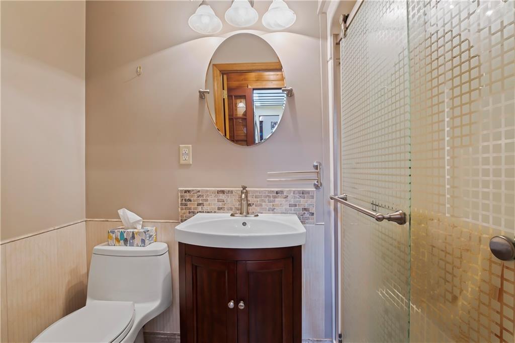 143 Lynn Road Washington, PA 15301 - Photo 12 of 25 a bathroom with a sink and a mirror