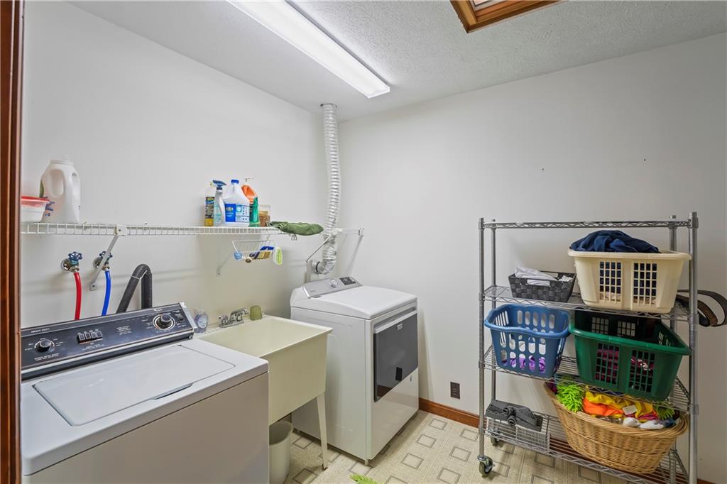 143 Lynn Road Washington, PA 15301 - Photo 13 of 25 a utility room with dryer and washer