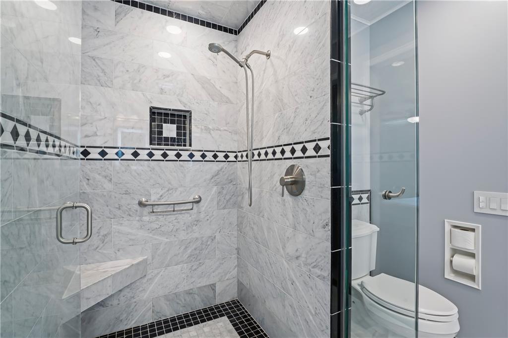 143 Lynn Road Washington, PA 15301 - Photo 16 of 25 a bathroom with a shower and toilet