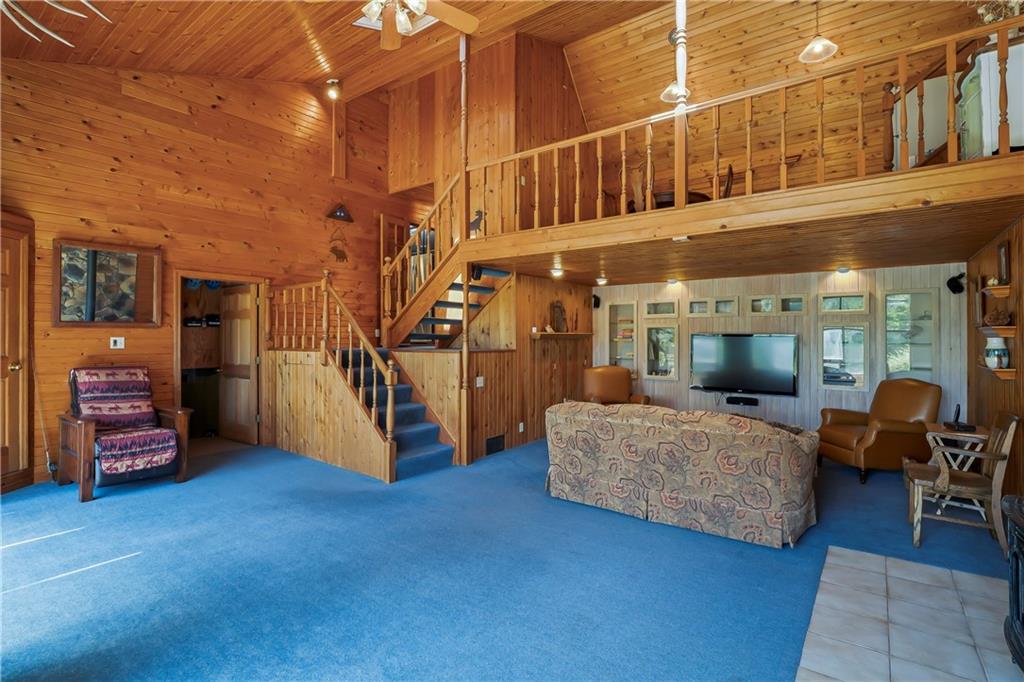 143 Lynn Road Washington, PA 15301 - Photo 22 of 25 a living room with furniture and a chandelier