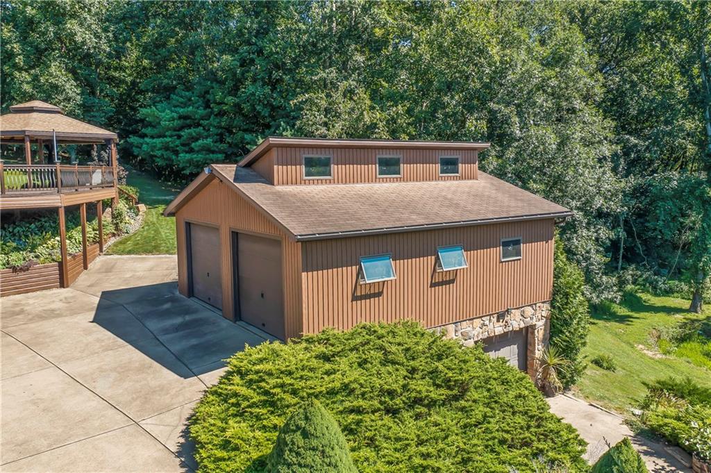 143 Lynn Road Washington, PA 15301 - Photo 3 of 25 a house view with a sink and garden
