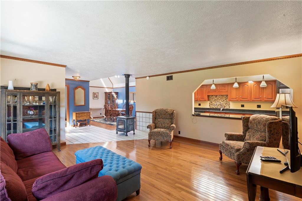 143 Lynn Road Washington, PA 15301 - Photo 8 of 25 a living room with furniture and a floor to ceiling window