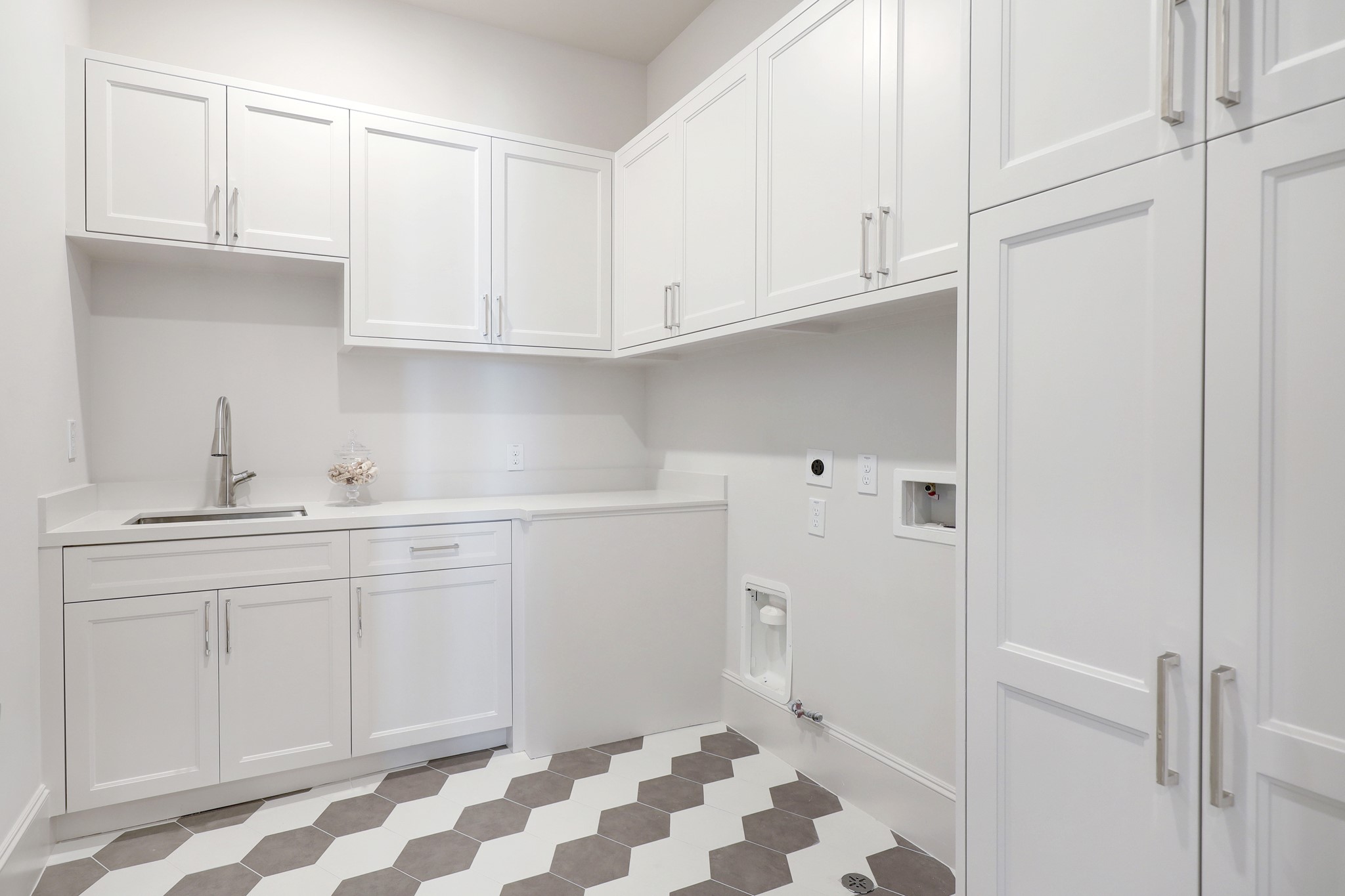 111 Wellington Row Road Houston, TX 77024 - Photo 12 of 19 a kitchen with a sink and cabinets