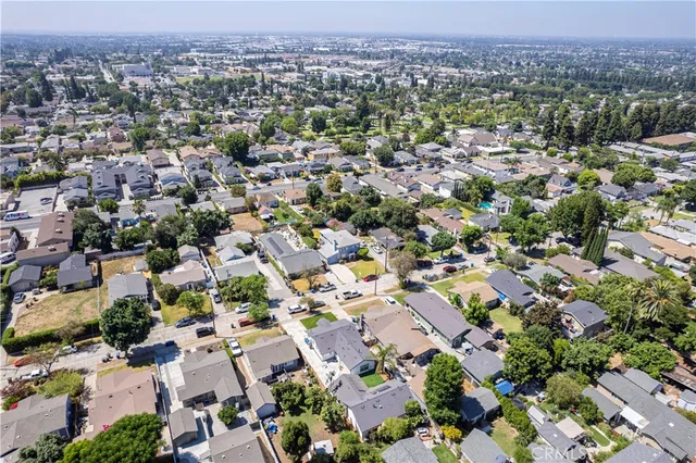 an aerial view of a city with lots of residential buildings