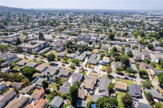 an aerial view of a city with lots of residential buildings
