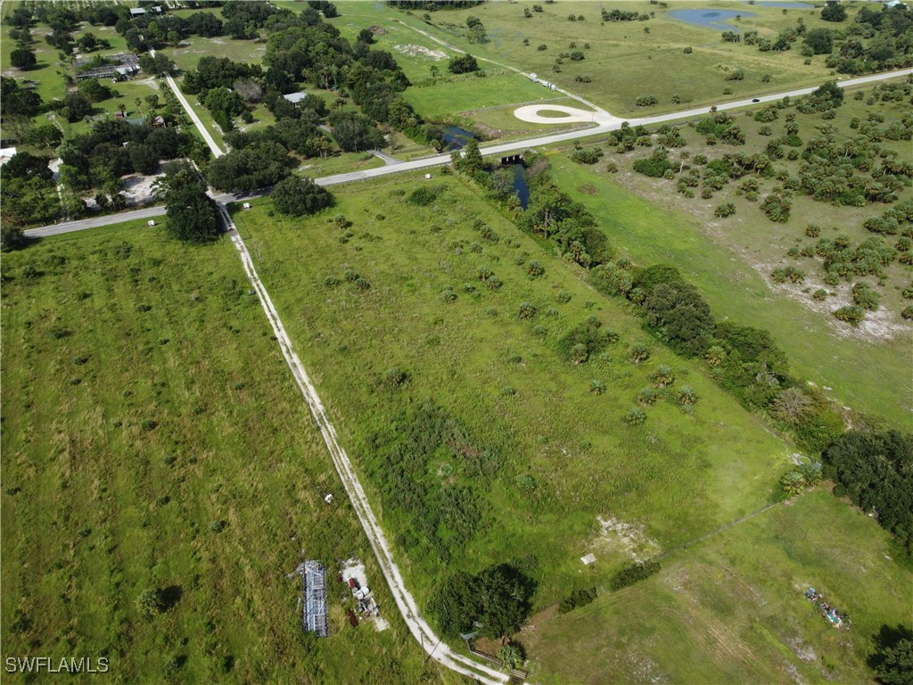 23960 North River Road Alva, FL 33920 - Photo 5 of 17 a view of a yard with plants
