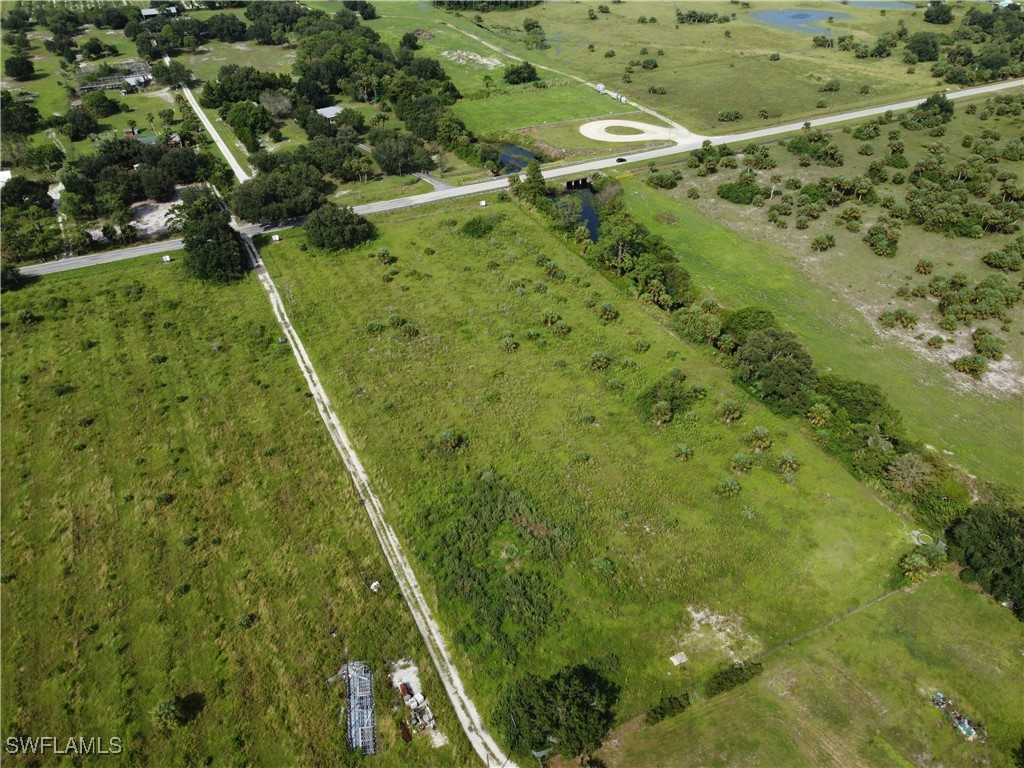 23960 North River Road Alva, FL 33920 - Photo 6 of 17 a view of a yard with plants