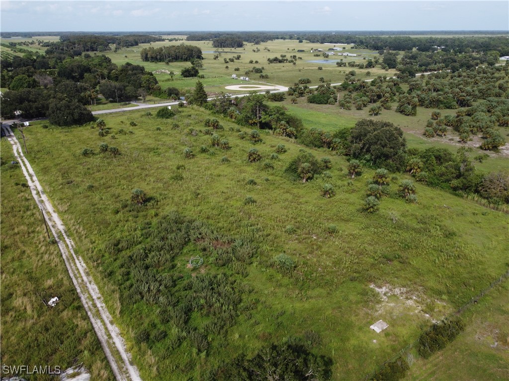 23960 North River Road Alva, FL 33920 - Photo 7 of 17 a view of a forest from a balcony