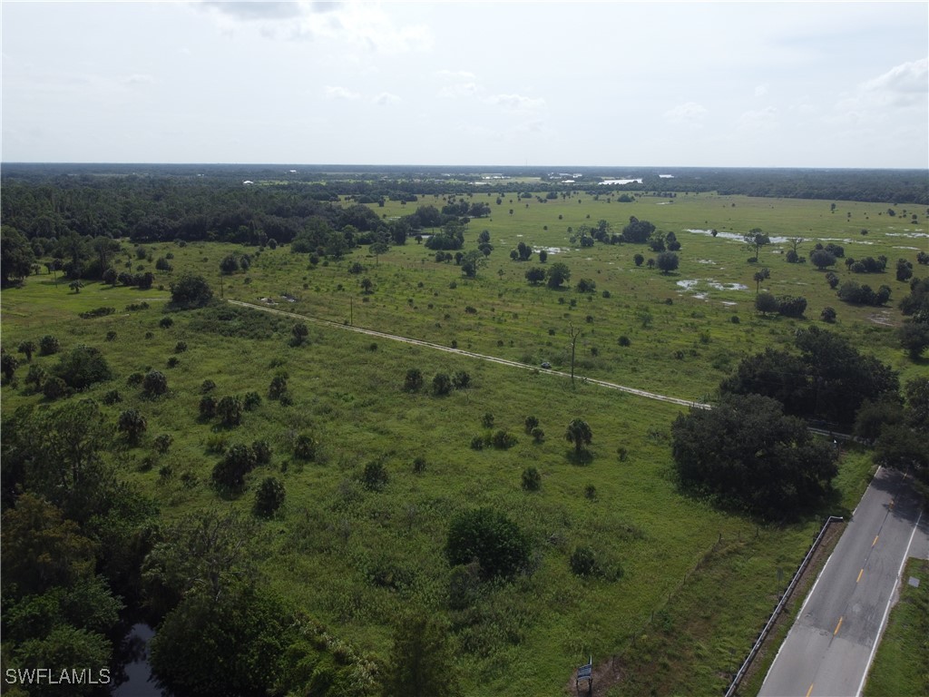 23960 North River Road Alva, FL 33920 - Photo 8 of 17 a view of a city with lush green forest