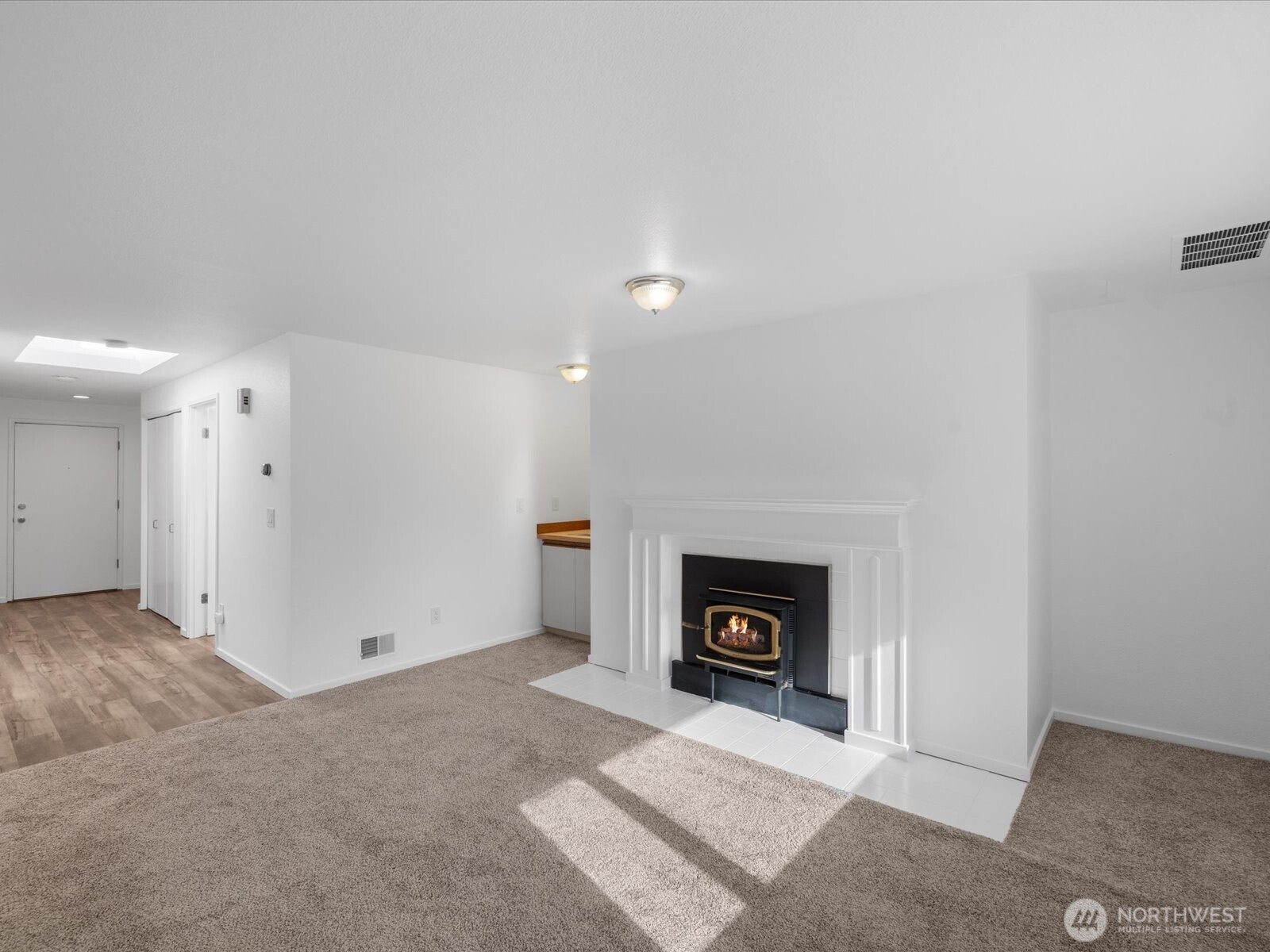 8225 212th Street Southwest, Unit 302 Edmonds, WA 98026 - Photo 2 of 16 a view of an empty room