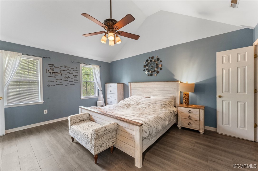 2501 Brookforest Road Midlothian, VA 23112 - Photo 19 of 30 a bedroom with a bed and a chandelier