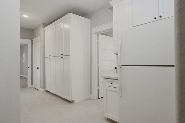 a bathroom with a sink vanity and a mirror