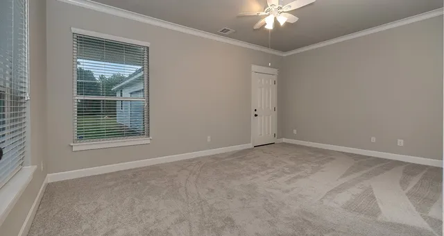 a view of a garage with a bike and a roof