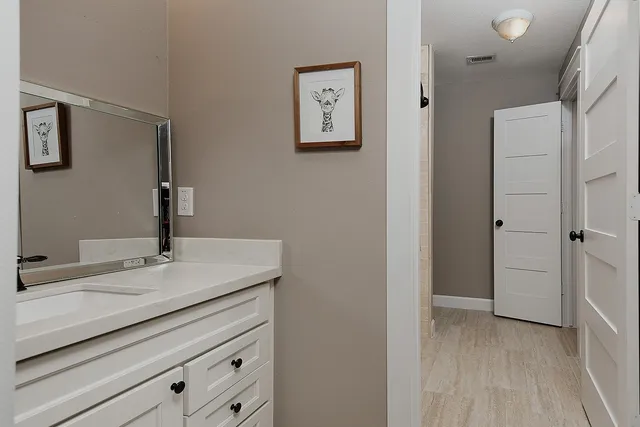 a view of a park with a tree