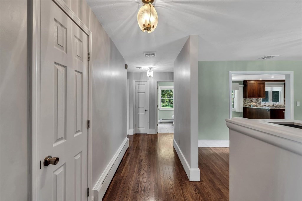 1164 High Street Bridgewater, MA 02324 - Photo 13 of 29 a view of hallway with chandelier and entryway
