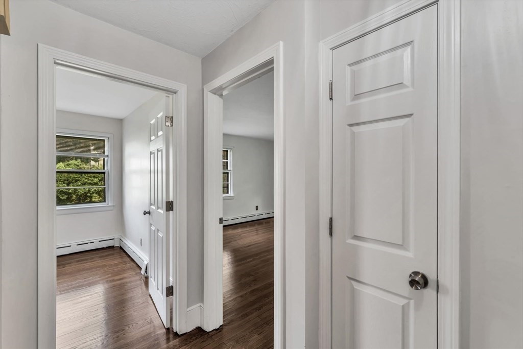 1164 High Street Bridgewater, MA 02324 - Photo 14 of 29 a view of a hallway with wooden floor and closet area