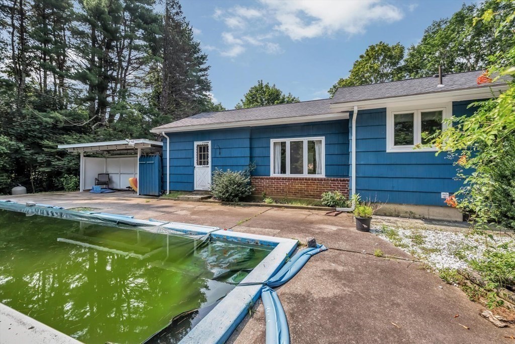 1164 High Street Bridgewater, MA 02324 - Photo 24 of 29 a view of house with swimming pool and porch