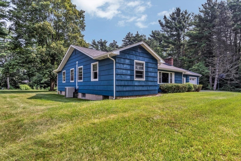 1164 High Street Bridgewater, MA 02324 - Photo 27 of 29 a view of a house with a backyard
