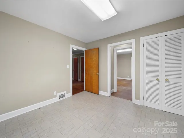 an empty room with closet