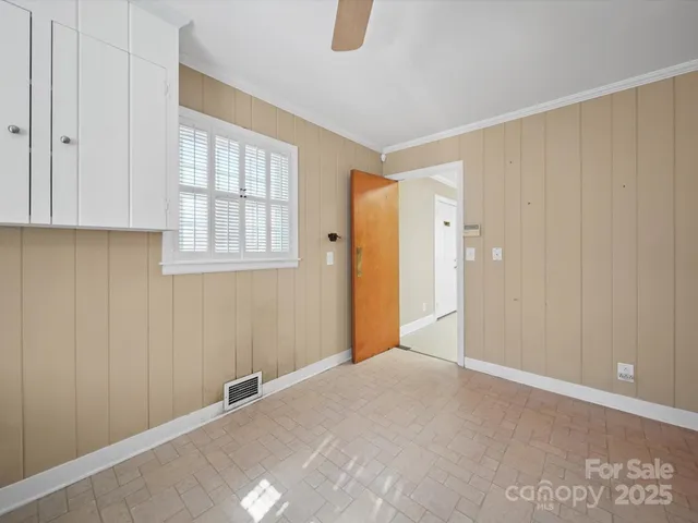 a view of an empty room with window