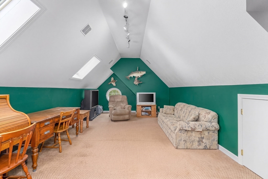 113 Greenwich Plains Road Ware, MA 01082 - Photo 32 of 42 a living room with furniture and a fireplace