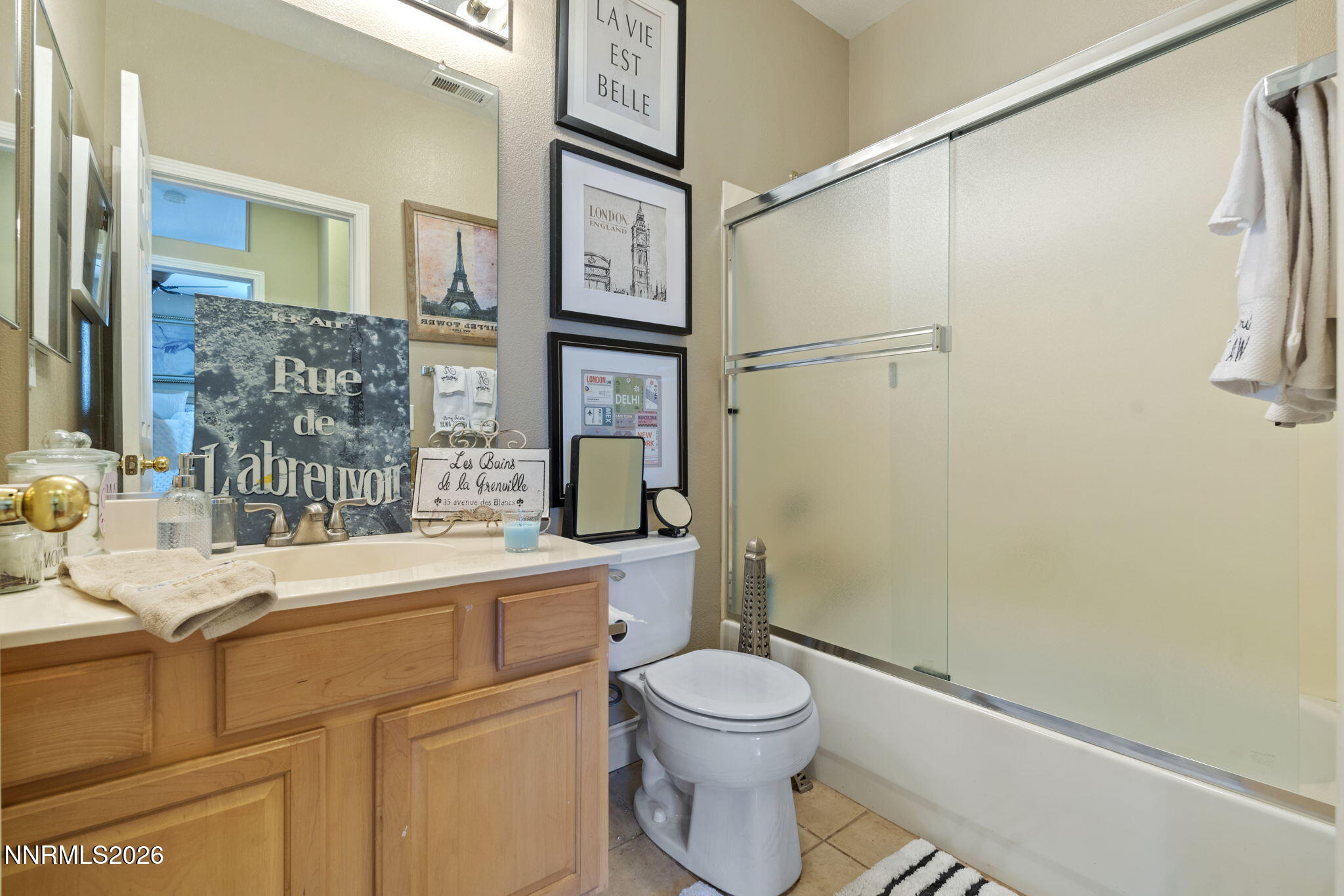 1600 Mountain Lane Reno, NV 89521 - Photo 17 of 24 a bathroom with a sink a toilet and shower