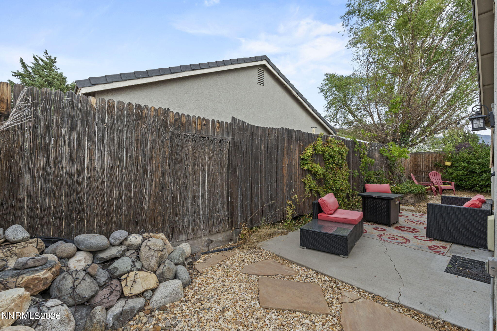 1600 Mountain Lane Reno, NV 89521 - Photo 22 of 24 a backyard of a house with lots of green space