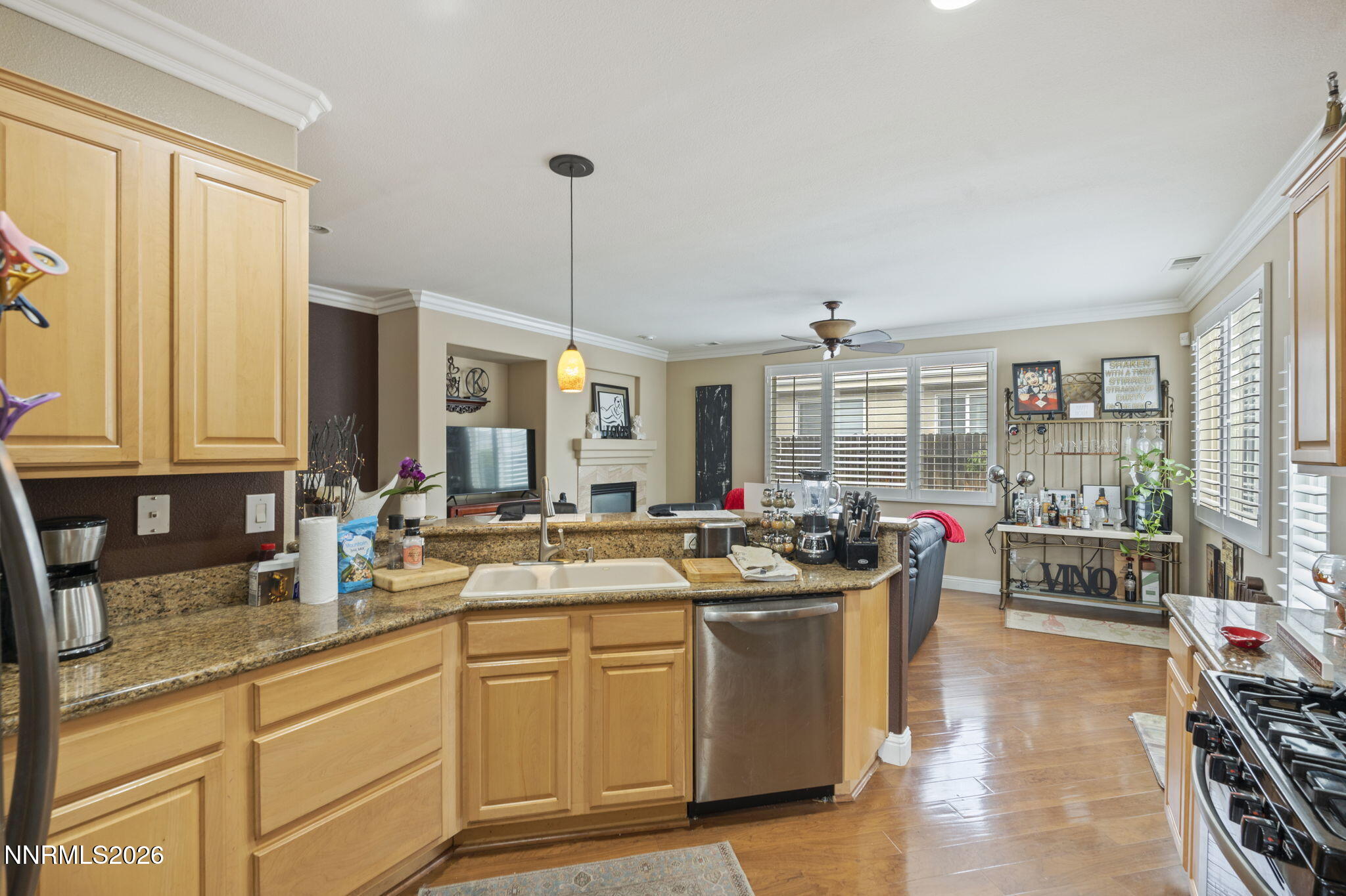 1600 Mountain Lane Reno, NV 89521 - Photo 6 of 24 a kitchen with sink stove and cabinets