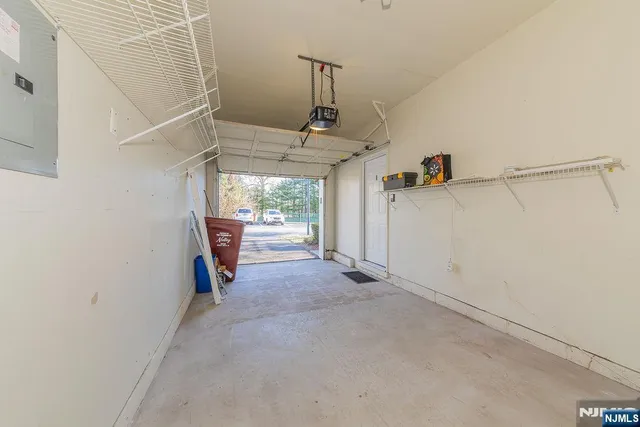 a view of a room with racks on the wall
