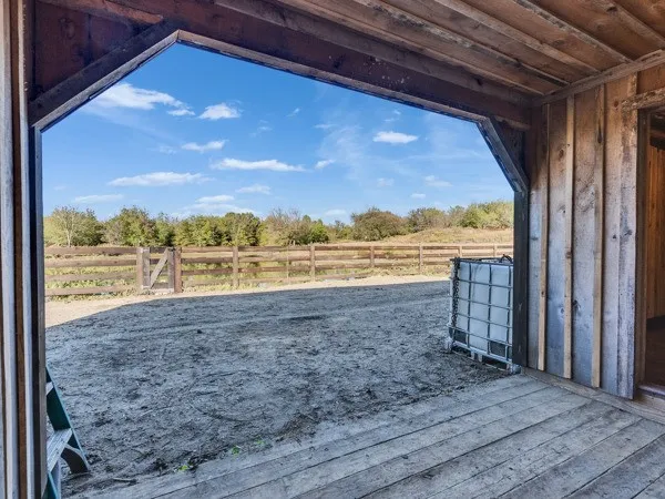 a wooden door with yard
