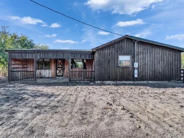 a wooden door with yard