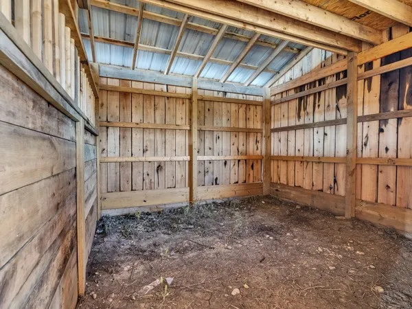 a view of an empty room with stairs