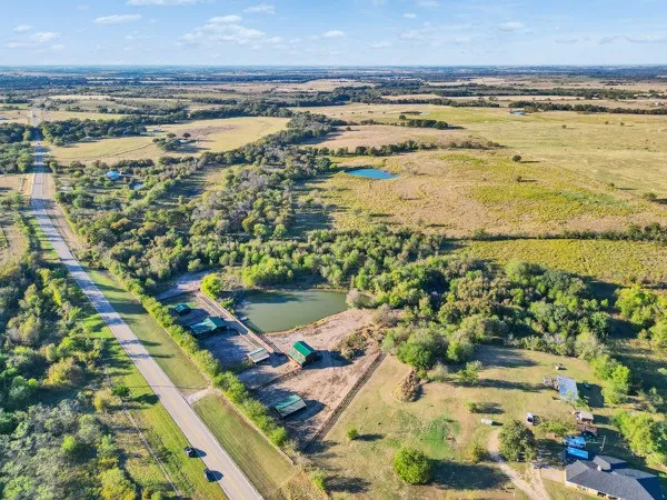 a view of a yard with an outdoor space