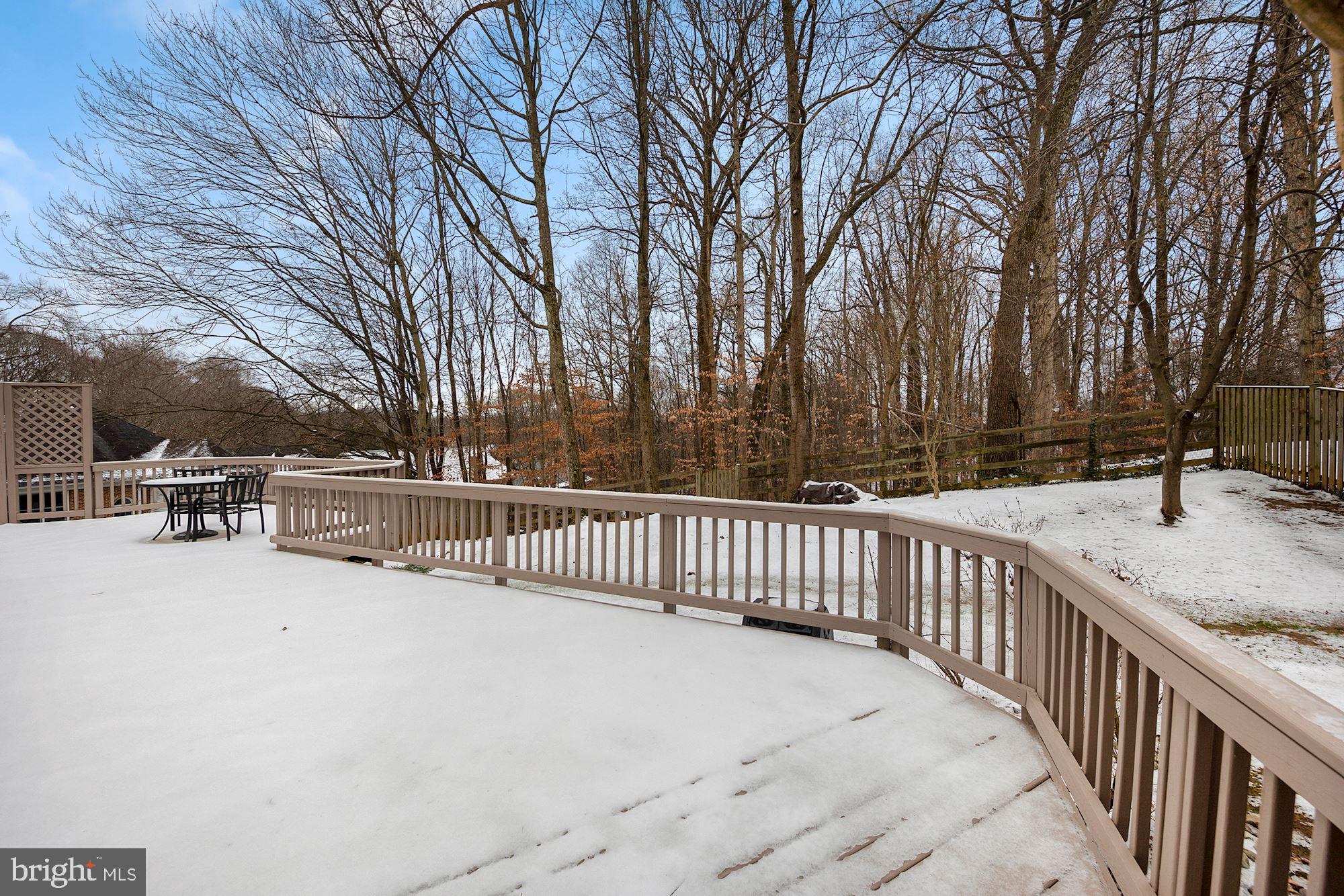 6808 Rannoch Road Bethesda, MD 20817 - Photo 37 of 38 Deck off fenced yard and gate to wooded area
