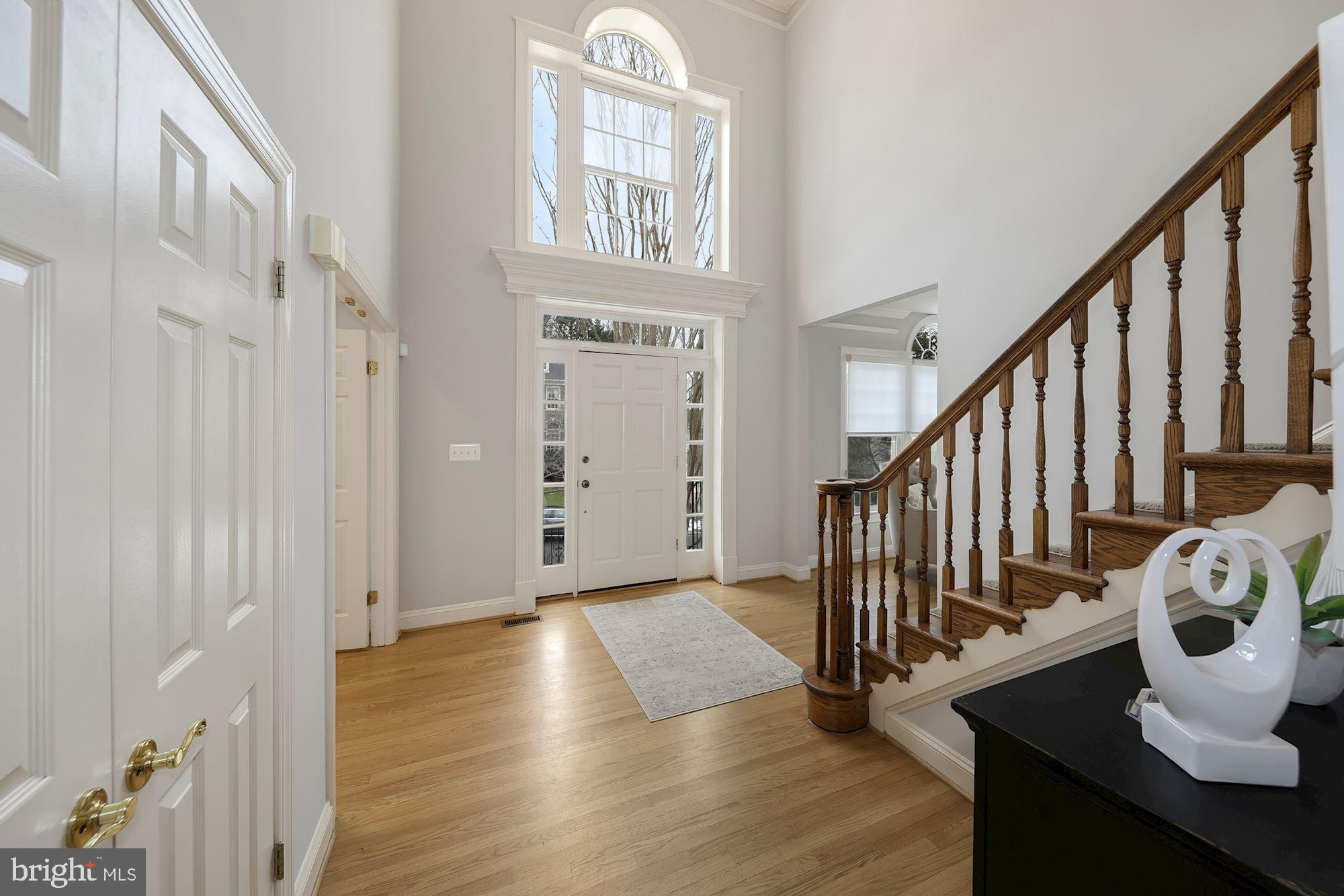 6808 Rannoch Road Bethesda, MD 20817 - Photo 5 of 38 Light filled foyer with coat closet