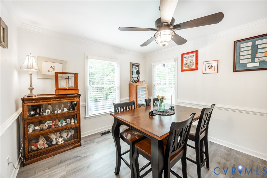 5603 Standing Oak Road Midlothian, VA 23112 - Photo 16 of 43 Dining area featuring wood-finish flooring, white