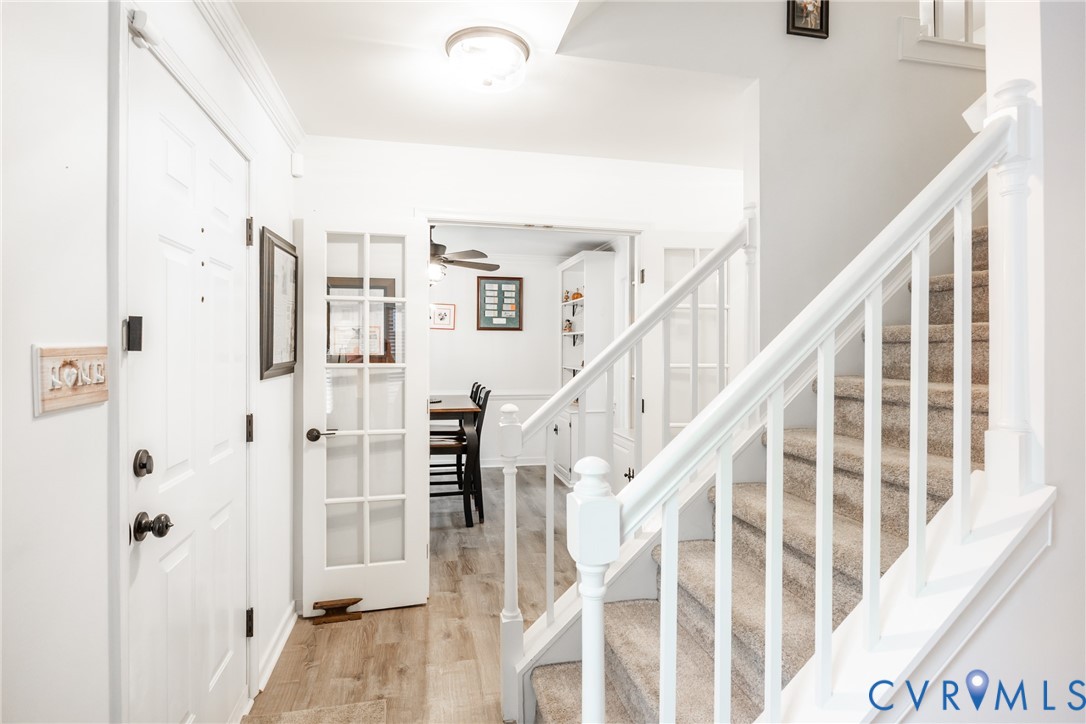5603 Standing Oak Road Midlothian, VA 23112 - Photo 19 of 43 Foyer with light wood-finish flooring, white panel
