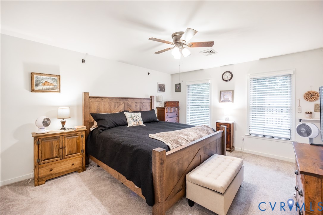 5603 Standing Oak Road Midlothian, VA 23112 - Photo 21 of 43 Carpeted bedroom featuring a ceiling fan with inte