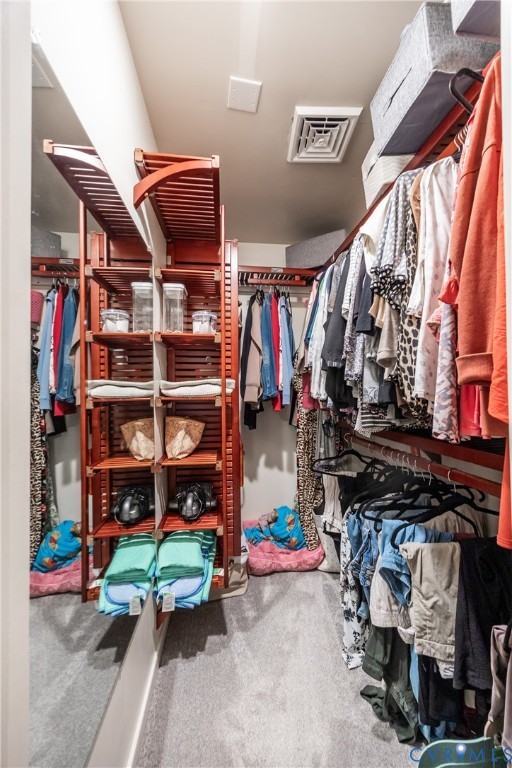 5603 Standing Oak Road Midlothian, VA 23112 - Photo 23 of 43 Custom closet system featuring rich wood-tone shel