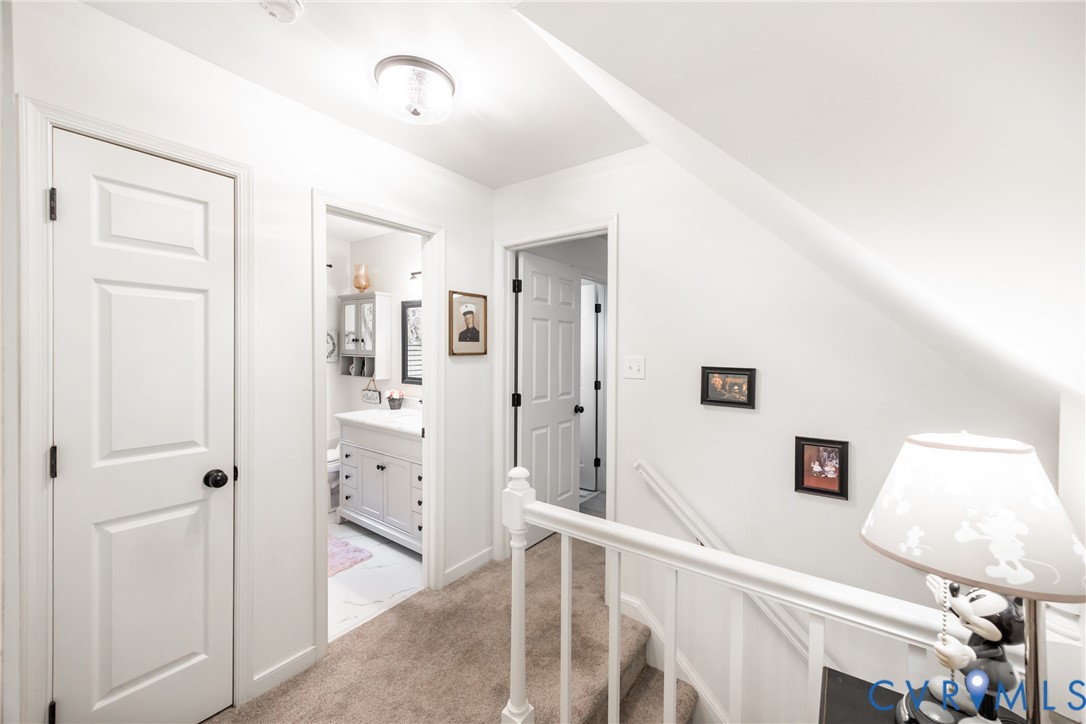 5603 Standing Oak Road Midlothian, VA 23112 - Photo 26 of 43 Upper-level landing featuring textured carpeting a