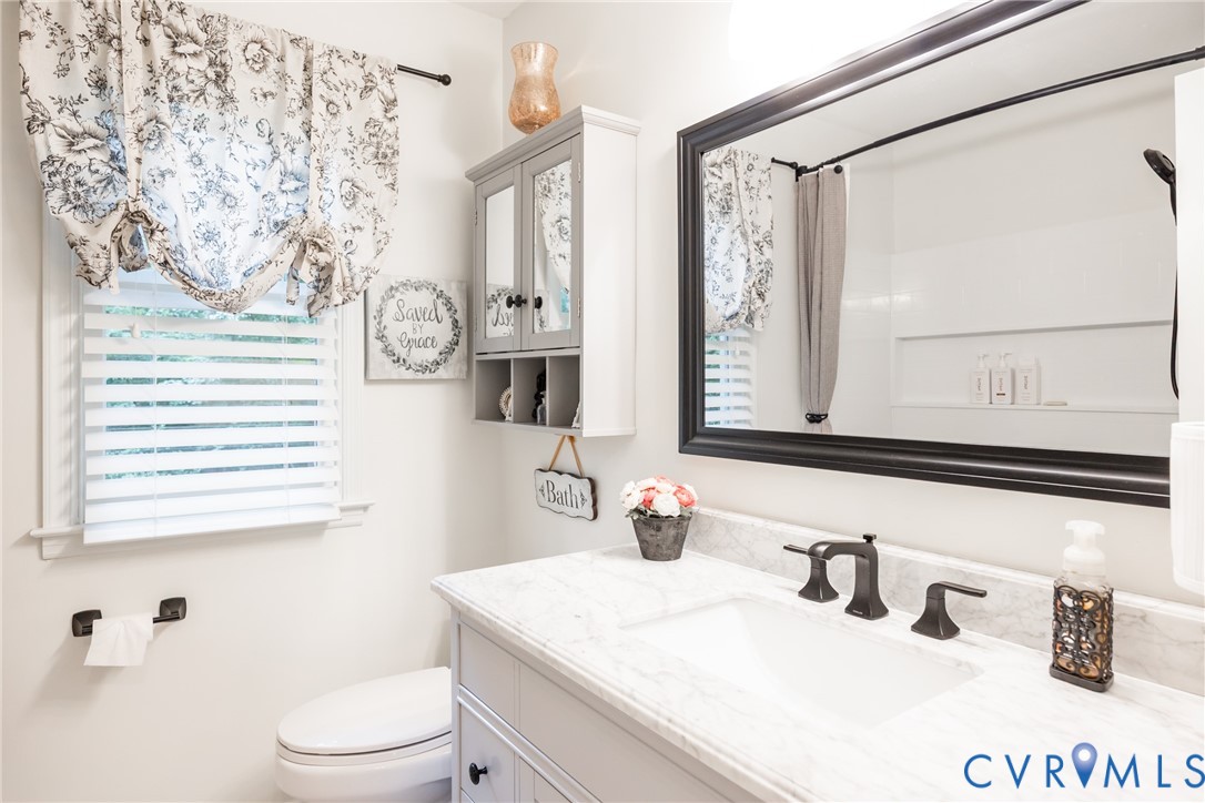 5603 Standing Oak Road Midlothian, VA 23112 - Photo 27 of 43 Bathroom featuring a white vanity with a rectangul