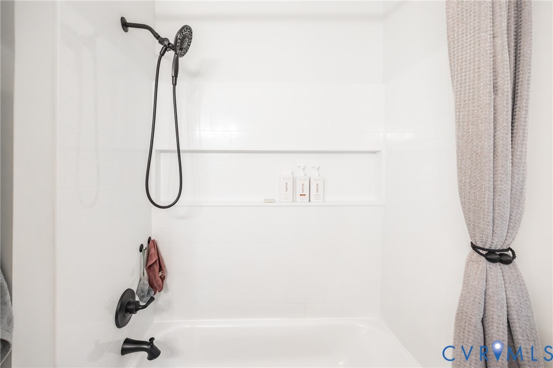 5603 Standing Oak Road Midlothian, VA 23112 - Photo 28 of 43 White tub and shower combination featuring matte b