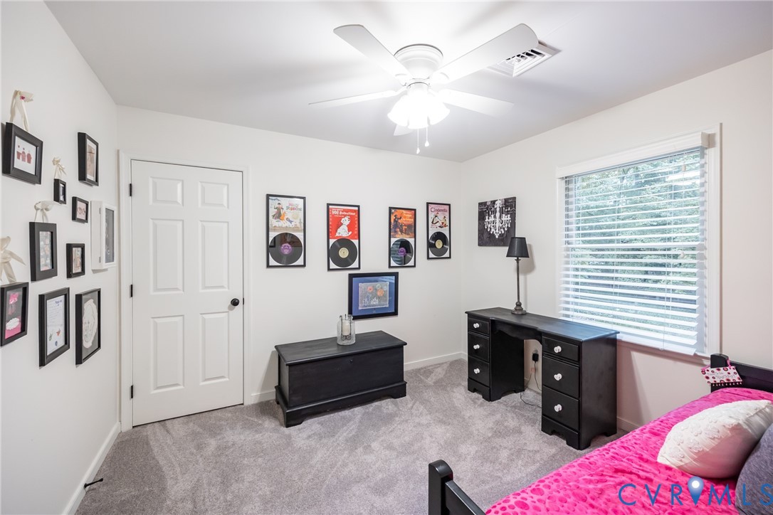 5603 Standing Oak Road Midlothian, VA 23112 - Photo 31 of 43 Bright room with light-toned walls and plush carpe
