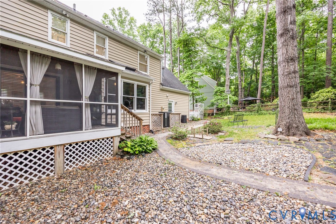 5603 Standing Oak Road Midlothian, VA 23112 - Photo 36 of 43 Expansive outdoor space featuring a screened porch