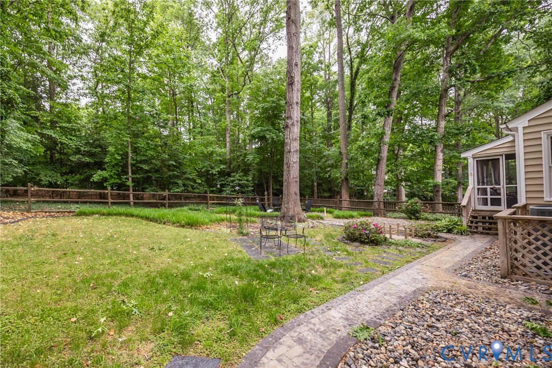 5603 Standing Oak Road Midlothian, VA 23112 - Photo 37 of 43 Expansive backyard featuring a stone paver pathway