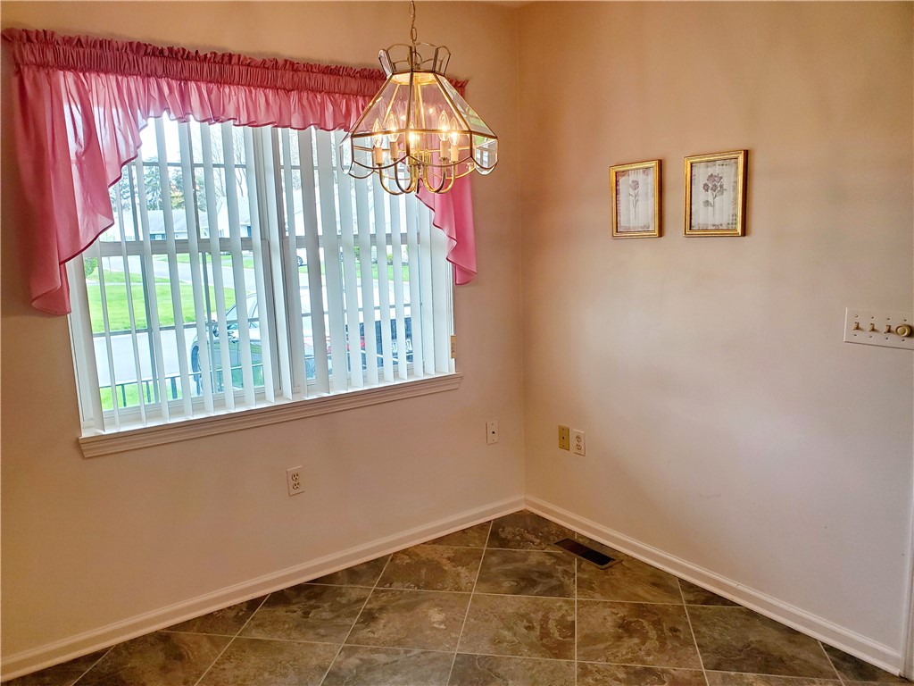 10 Coran Circle Greece, NY 14616 - Photo 5 of 44 Cozy eat-in kitchen, right off the garage.