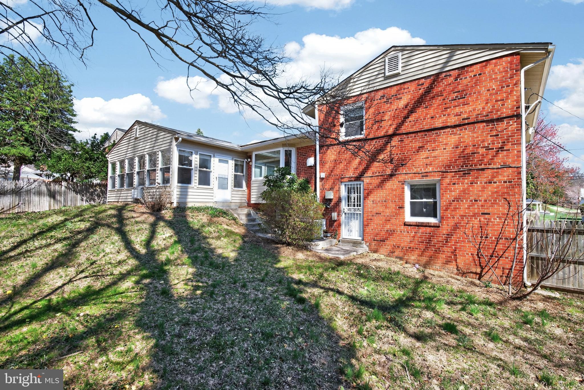 11004 Oakwood Street Silver Spring, MD 20901 - Photo 32 of 35 a view of a house with a yard