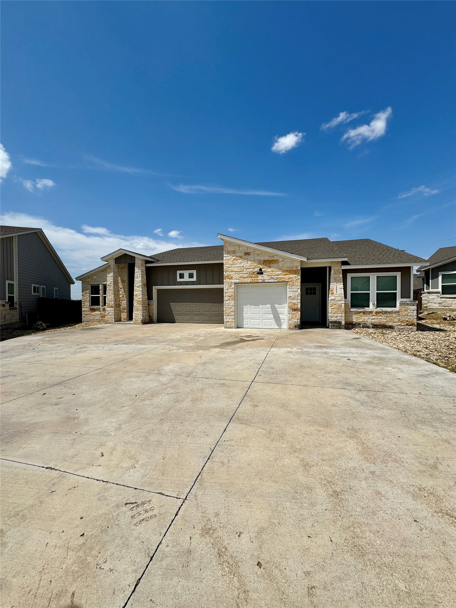 105 Everett Court, Unit B Jarrell, TX 76537 - Photo 16 of 16 a house with trees in front of it