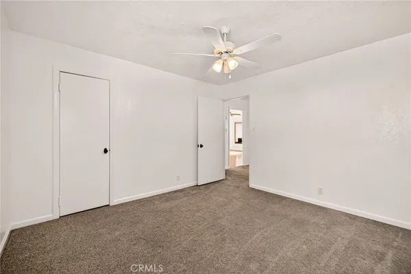 a view of a playground with basketball court